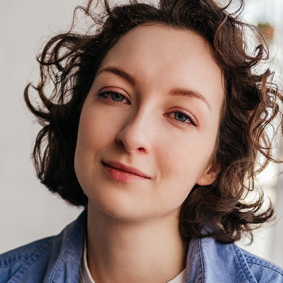 close up portrait of smiling young woman with shor WNWDJ jpg