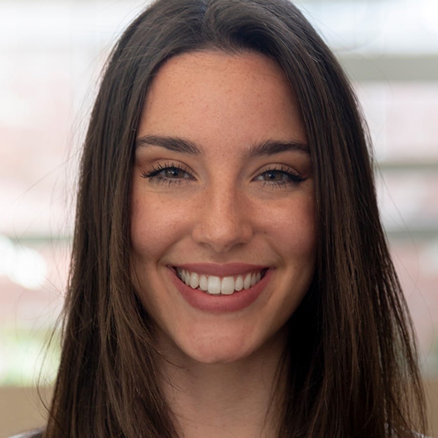 portrait of smiling young caucasian brunette woman MYZEAH jpg